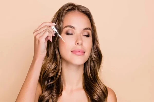 How do I apply the anti-pimple serum?